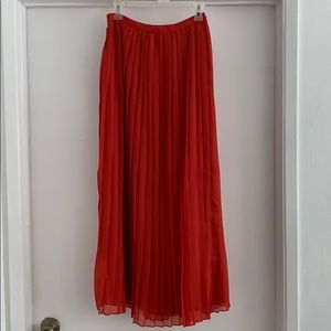 Red orange, high waisted long skirt.